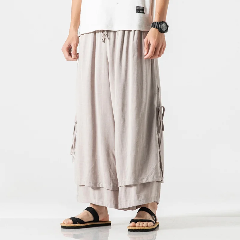 

Men Casual Withe Wide Leg Pants Mens Irregular Cotton Linen Harem Pants Male Solid Vintage Skirts Trousers