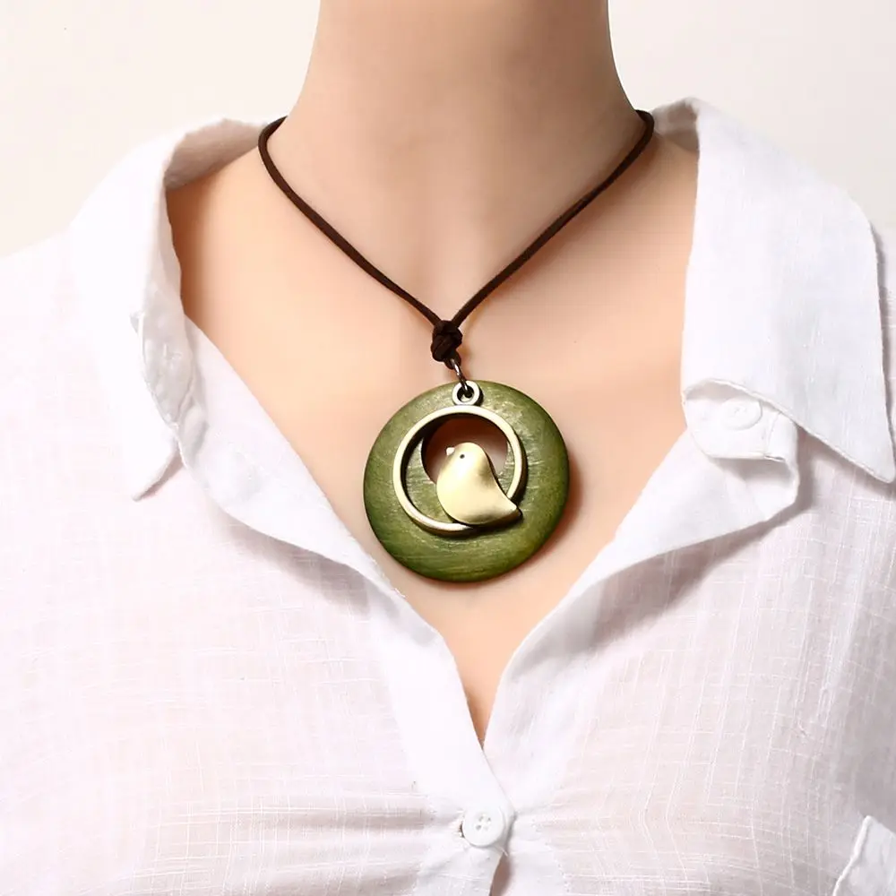 Vintage Wooden Bird Pendant Necklaces Boho Ethnic Style Metal Hollow Necklaces Retro Long Sweater Chain Rope Jewelry for Women