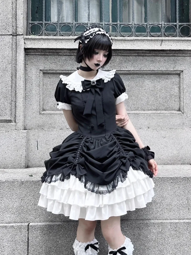 

Japanese Gothic Dark Lolita Subculture OP Dress Punk Style Doll Face Bow Short Sleeve Lace Patchwork Puff Dress Evening Dresses