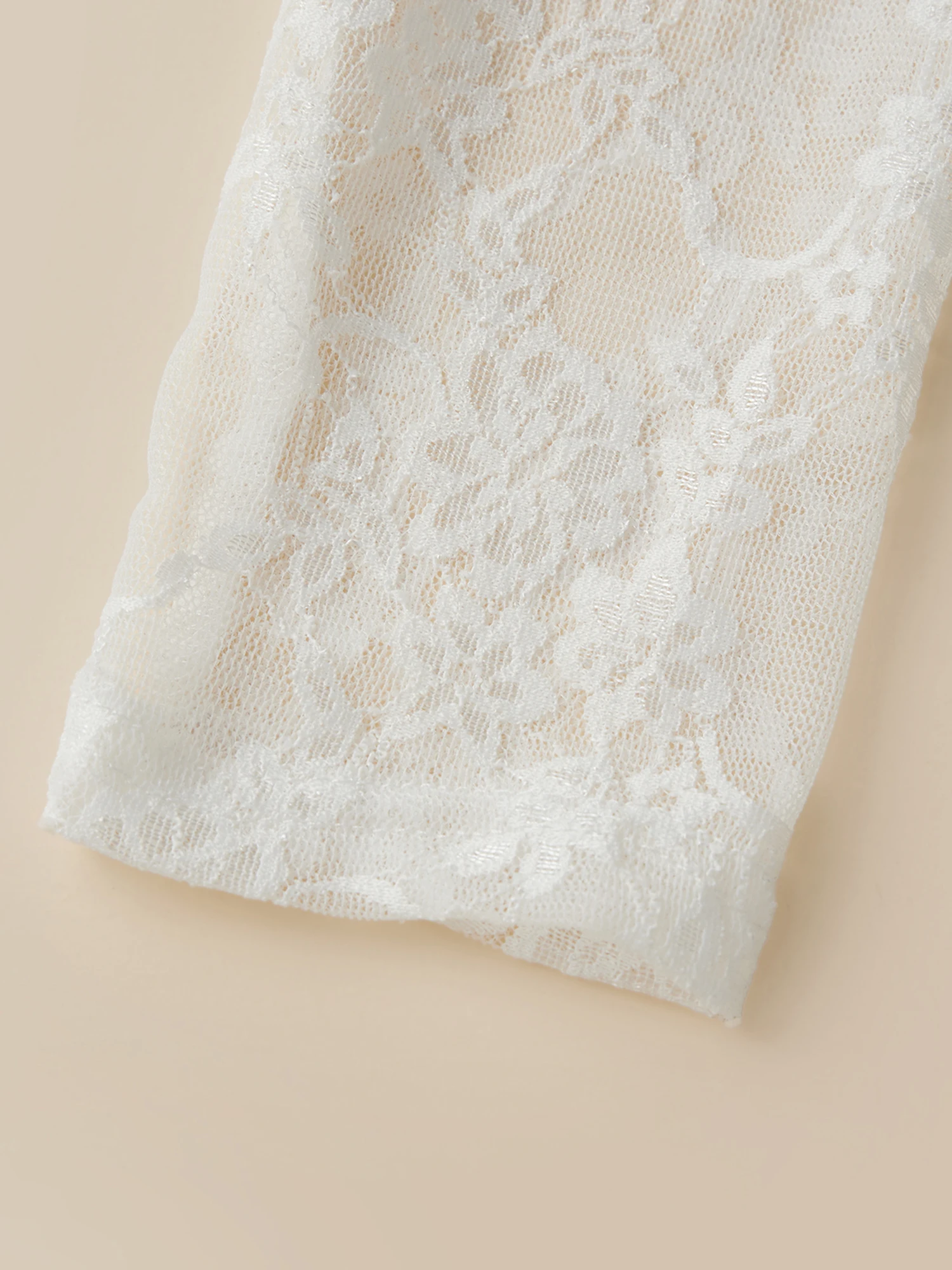 T-shirt élégant en dentelle florale pour femmes, manches longues, col rond, vêtements de printemps et d'automne