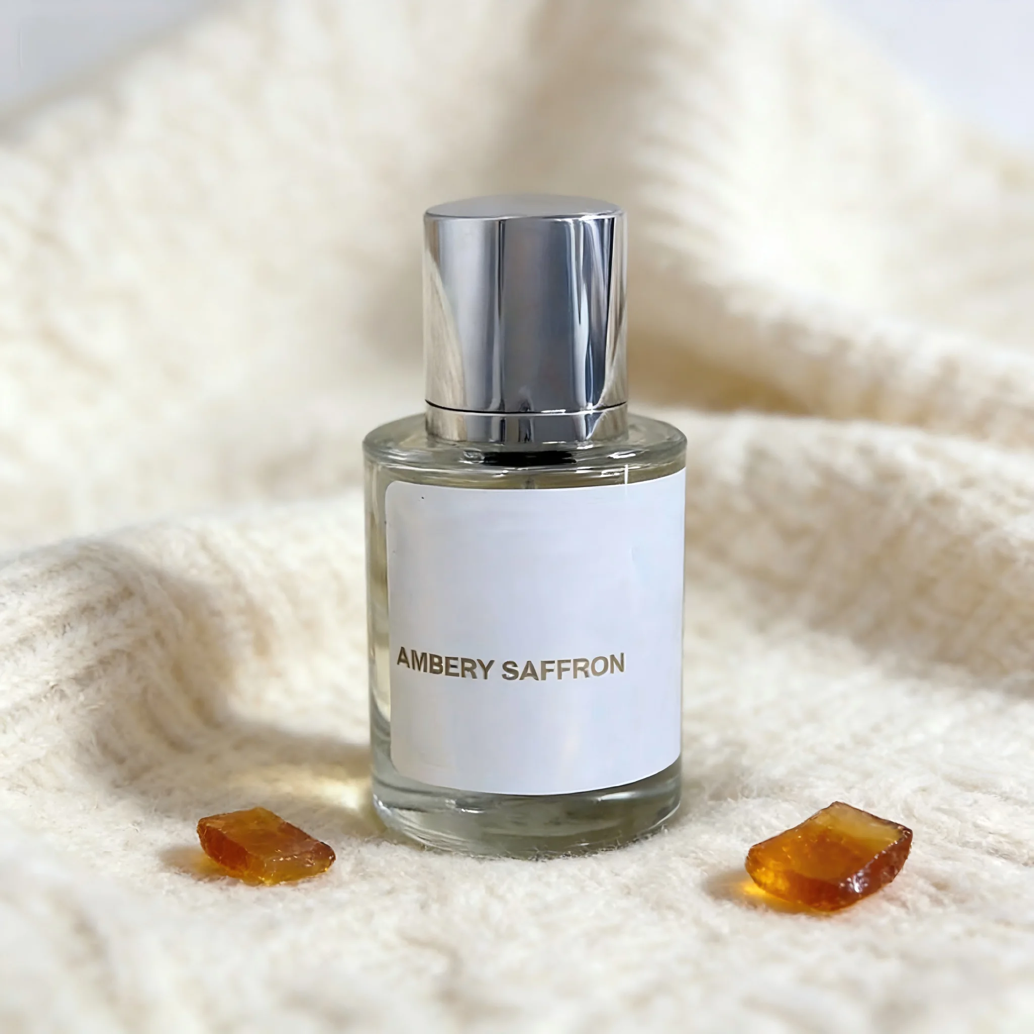 

Ambery Saffron Fragrance: Sleek Silver Cap, Premium Long-Lasting Aroma for All