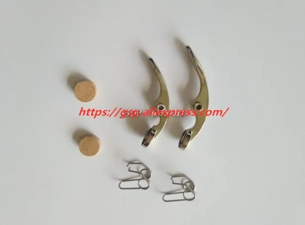 مجموعة واحدة من ملحقات البوق، صمام مخرج صغير، صمام مخرج مفتاح، صمام منفذ زنبركي، وسادة الفلين