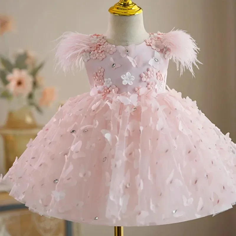 ลูกไม้สีชมพูดอกไม้สาวชุดสําหรับงานแต่งงานยาวผีเสื้อ Appliques Feather Princess First Communion วันเกิดชุดที่กําหนดเอง