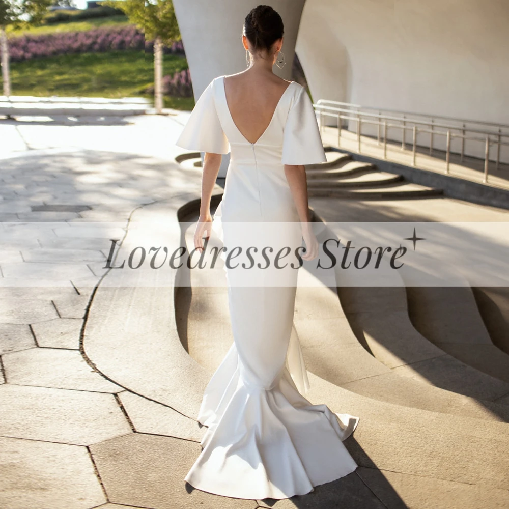 Chic Pure Color Asymmetrical Mermaid Wedding Dresses Customized Sexy Deep V-Neck Ruffles Half Sleeves Jersey Bridal Gowns