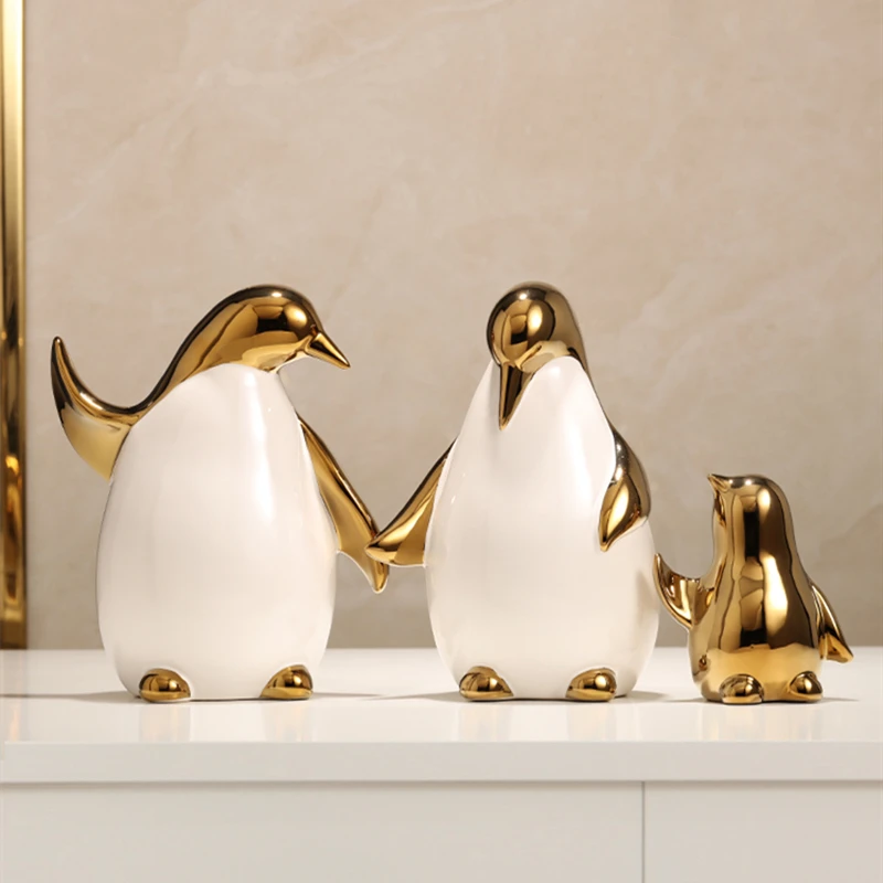 

Modern Luxury Eco-Friendly Ceramic Decorations Golden Penguin on Square Shape for Living Room Home Decor Product