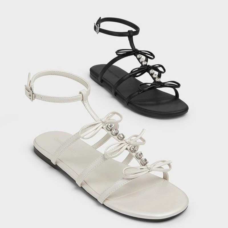 

2025 New High Quality Sandals for Women Ladies Fashion Elegant Rhinestone Elastic Band Open Toe Flat Roman Sandals for Women