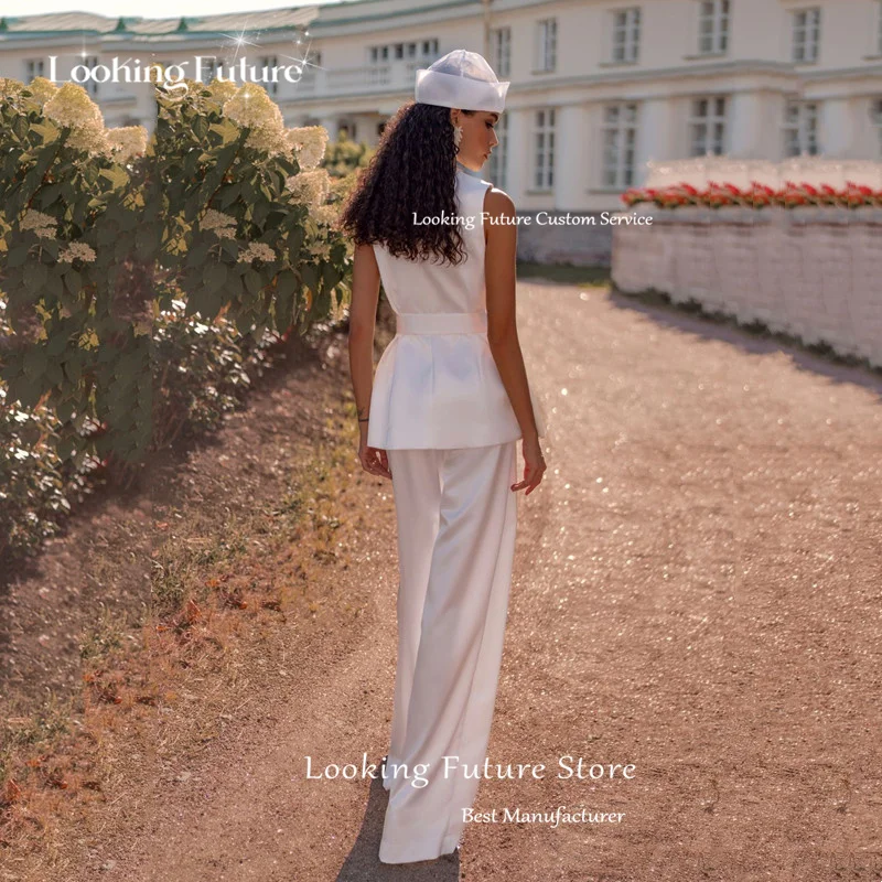 الحديثة السراويل الطويلة فساتين الزفاف الساتان للمرأة بلا أكمام الطية الزهور الزنانير مع جيب فستان مثير على شكل حرف v مخصص