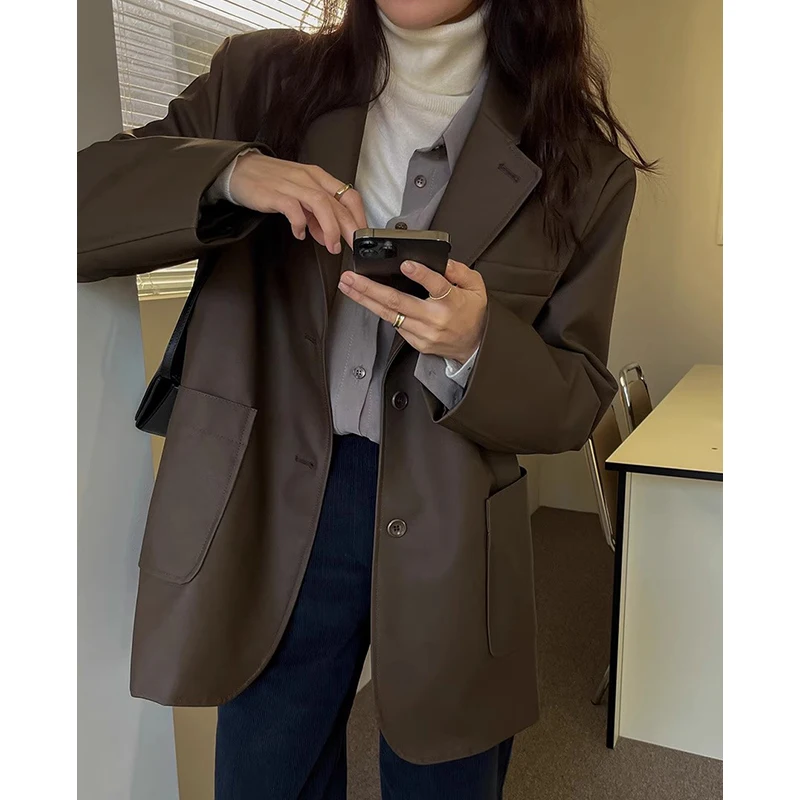 シックな秋冬ショート Pu レザージャケット女性のルーズフィット長袖スーツの襟コート大きなポケットファッショナブルなアウター