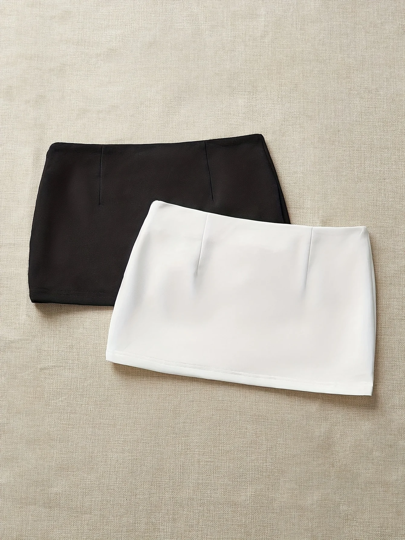 Stylish two-piece mini skirt set for women, simple, fashionable, casual, solid color.