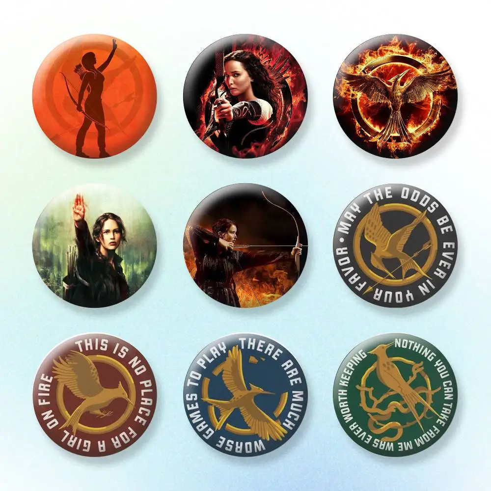 

The H-Hunger G-Games Badges Creative Tinplate Button PinsBrooch Badge Clothes Backpack