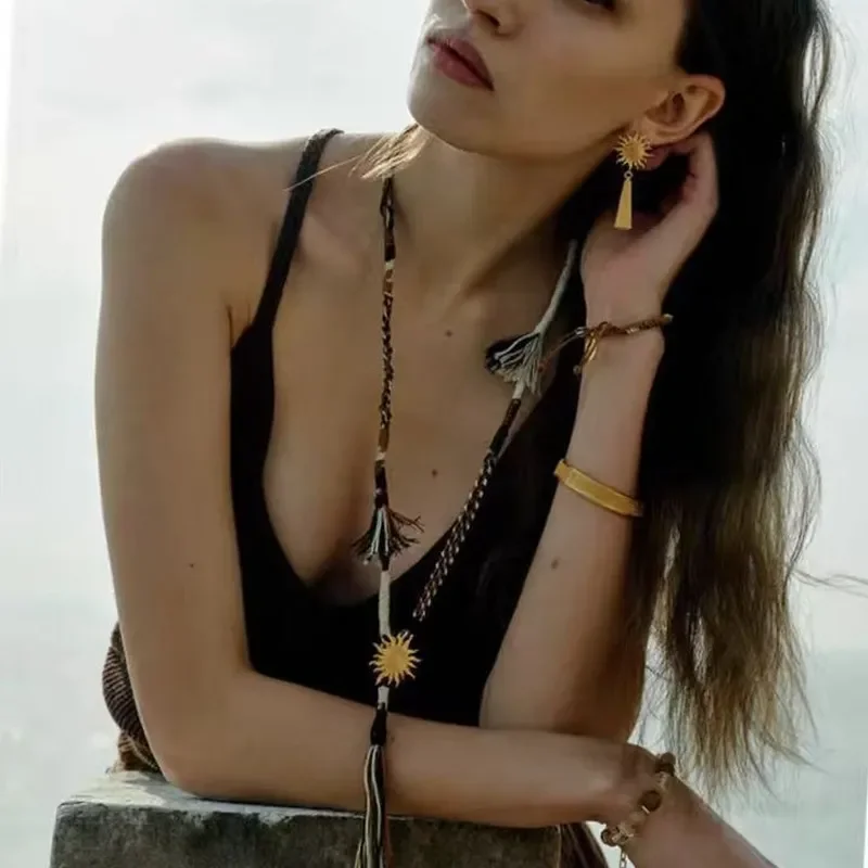 Spring and summer new Rising Sun wandering necklace niche design high-end long pendant leisure vacation wind long necklace