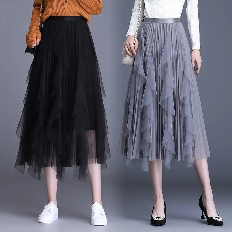 Saia de gaze irregular bege feminina outono e inverno cintura alta uma palavra malha plissada saia de balanço médio e longo