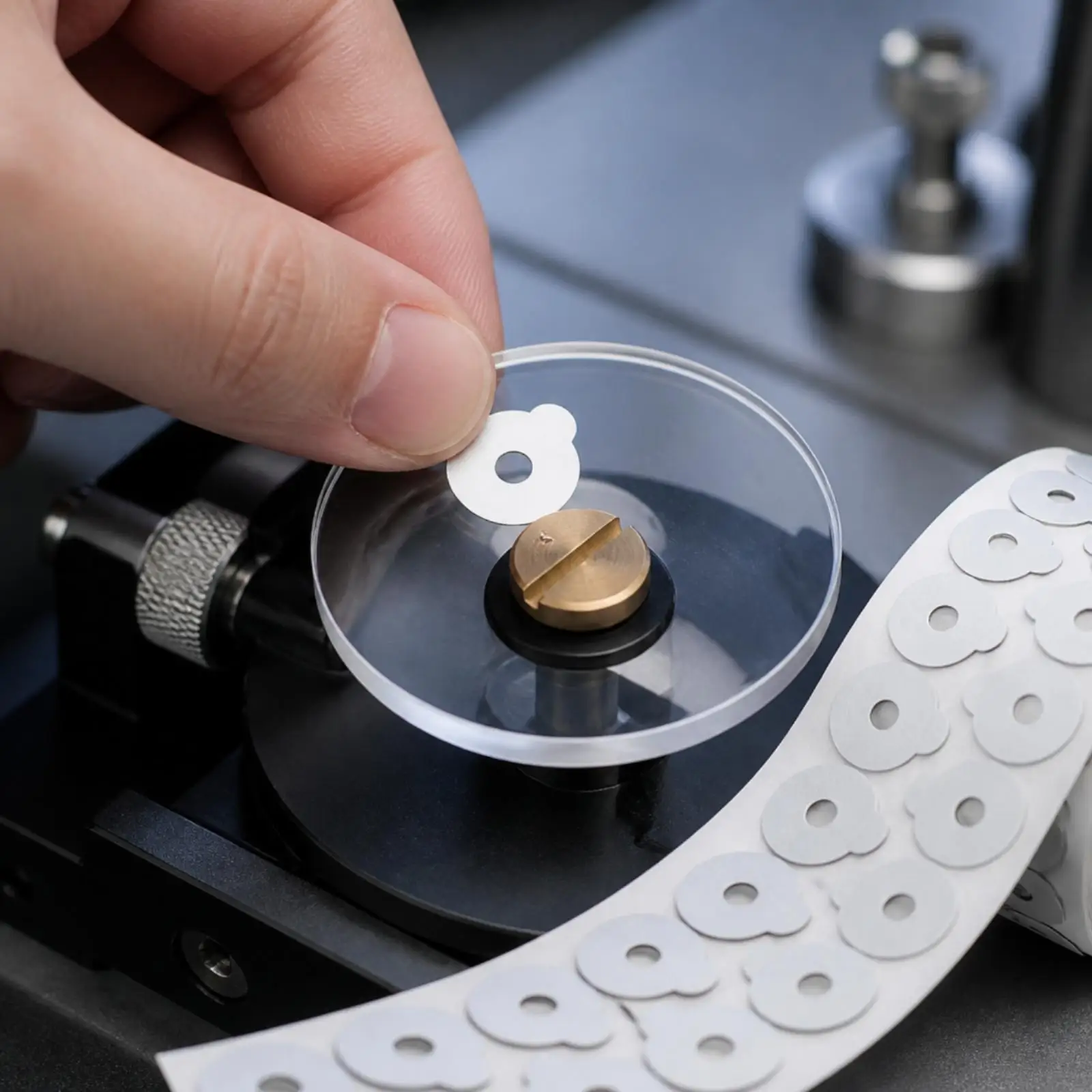 Adhesive Lens Grinding Sticker Roll with Central Hole for Precision Optical Lens Blocking and Polishing Tasks