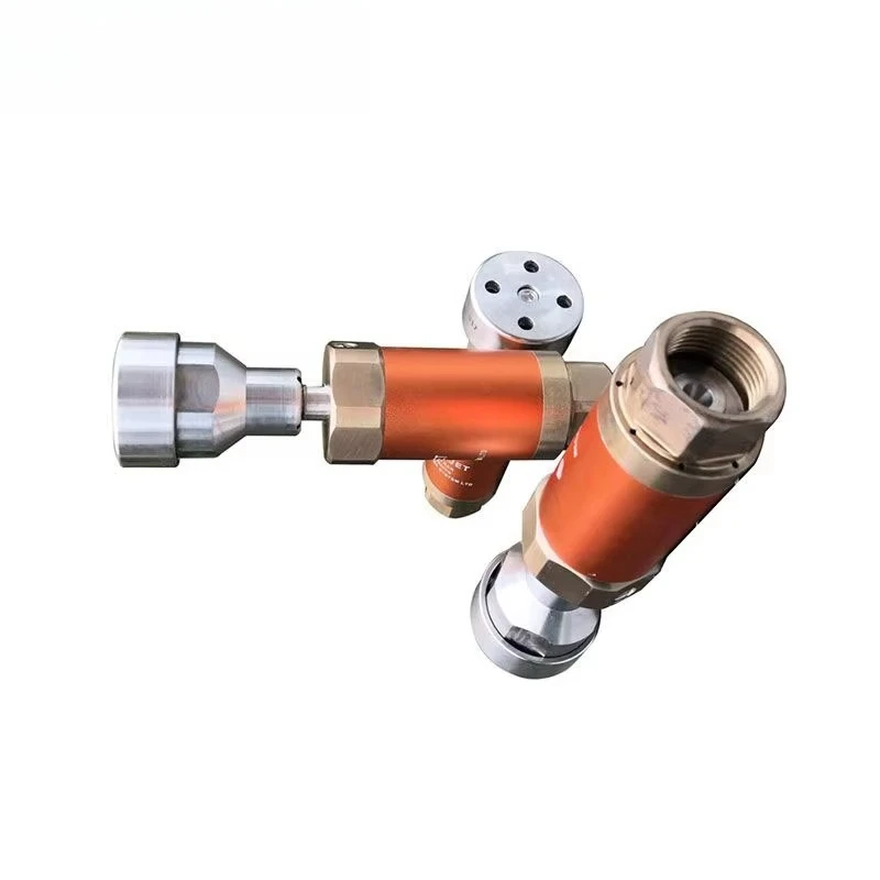 

High pressure rotating nozzle for cleaning machine parts