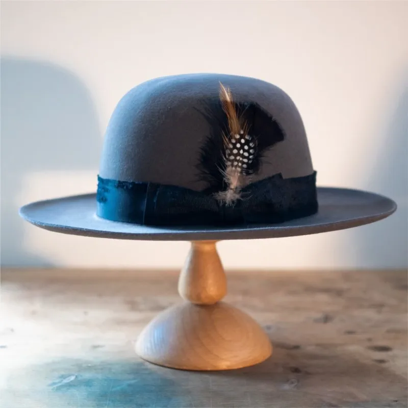 A fashionable and versatile dome felt hat with woven decoration