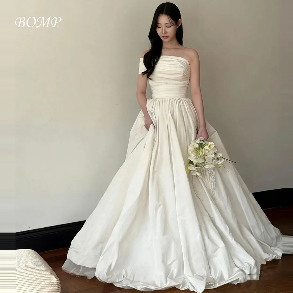 ชุดแต่งงานผ้าทาฟต้าสีงาช้างแบบหรูหรา แบรนด์ BOMP แบบไหล่เดียว สไตล์เกาหลี สำหรับถ่ายภาพงานแต่งงาน ชุดรับแขกเจ้าสาว สามารถสั่งตัดได้