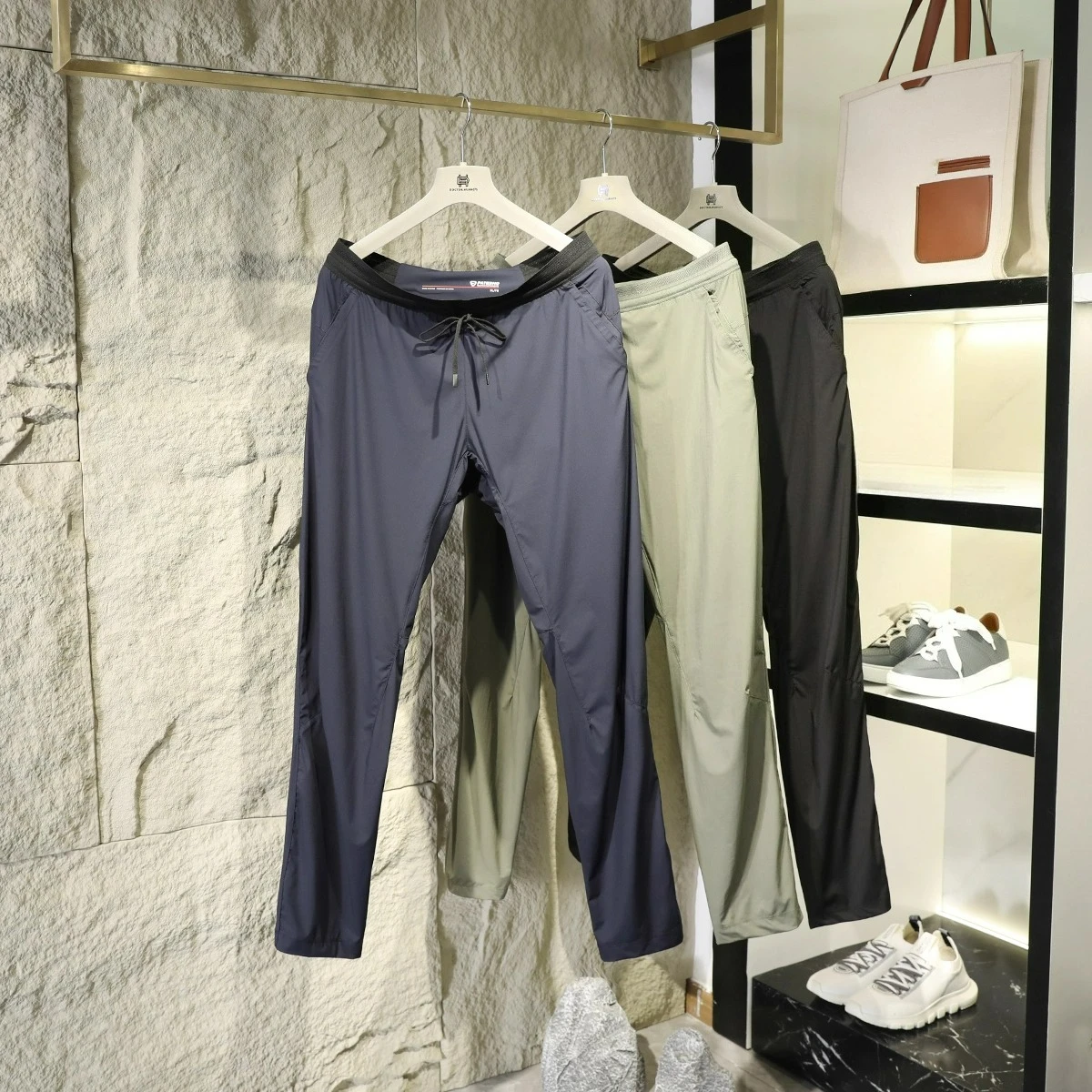 

Summer new light and thin outdoor sports breathable elastic casual pants cool and quick-drying three-proof trousers