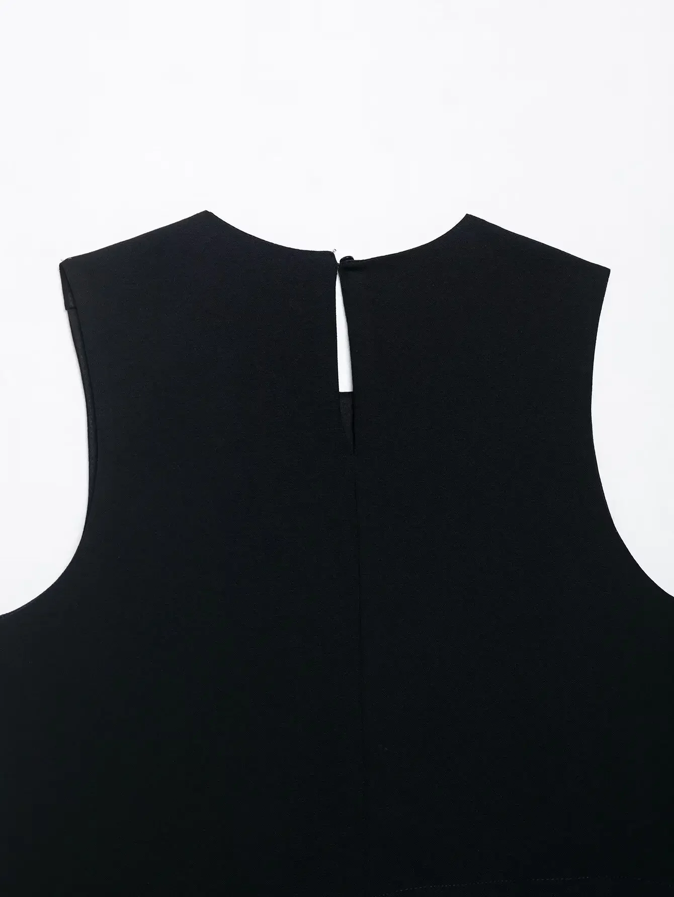 新しいノースリーブ春秋カジュアルベストトップス女性金属ボタン黒ベストトップファッション非対称スリムフィットベスト