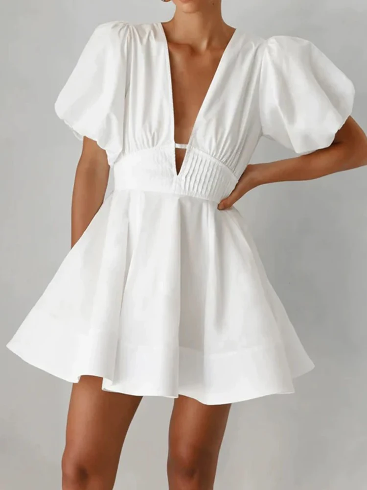 

Retro sexy deep V-neck bubble short-sleeved dress 2025 summer women's new temperament holiday slim big swing A-shaped fluffy ski