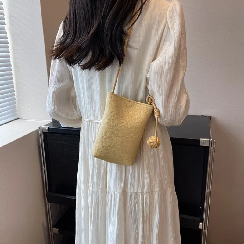 シンプルなヴィンテージおむつバッグ、ファッショナブルな高級レザーメッセンジャーバッグ、女性用クラシックデザイナーパリ通勤バッグ