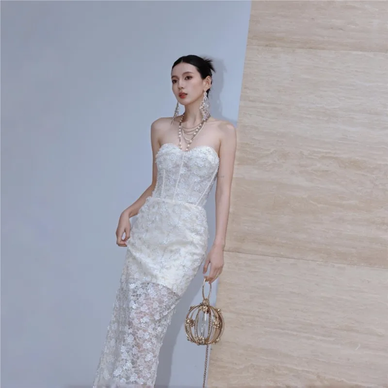 

New strapless body-hugging and lace dress with cutouts