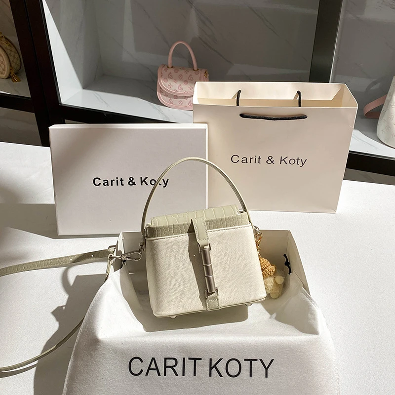 

Французская нишевая сумка-коробка в стиле колор-блок с премиальным дизайном, ручная сумка-ведро.