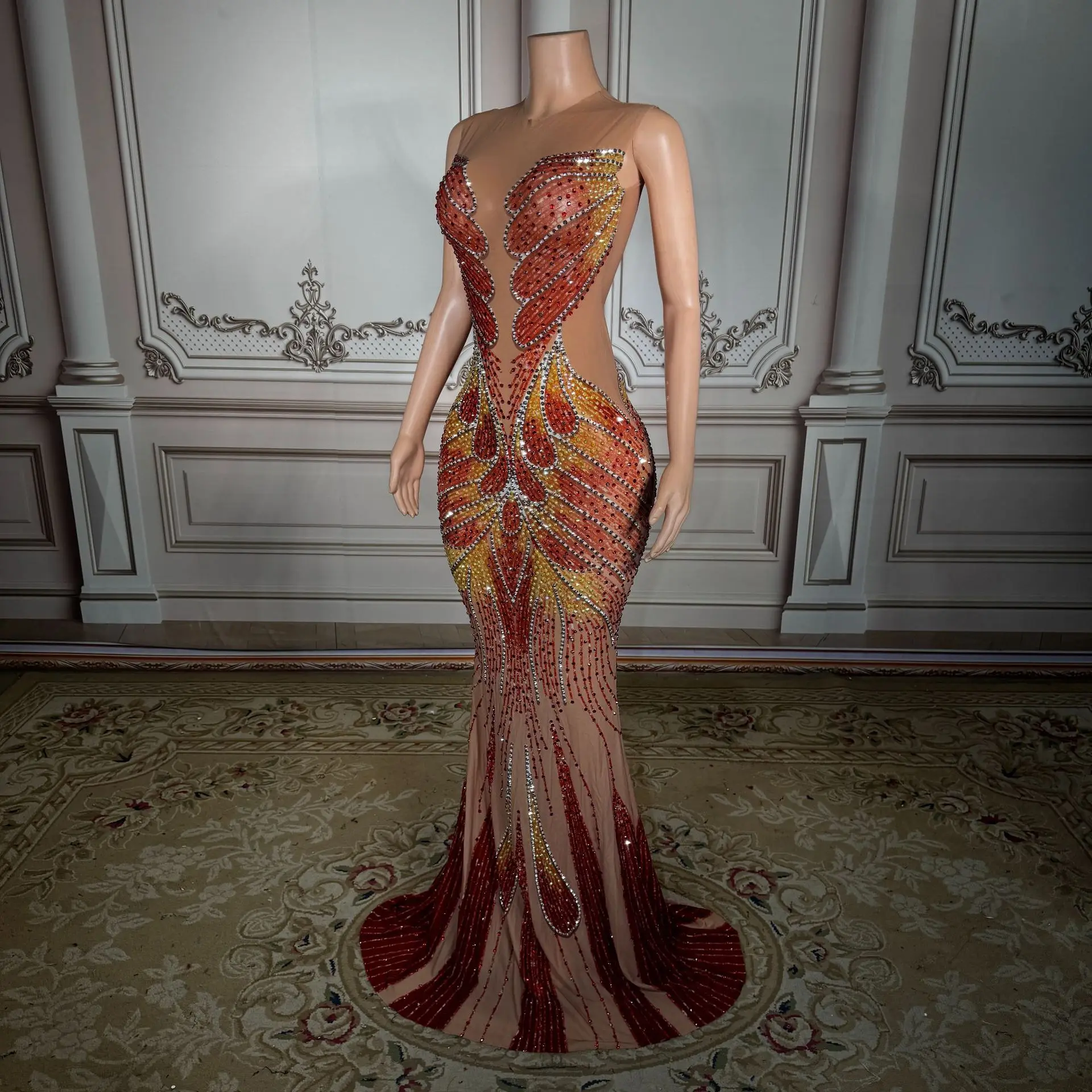 Design-inspired Rhinestone Netting Sheer Elegant Cocktail Dress for A Formal Event, Sleeveless and Fitted with A Flared Hem