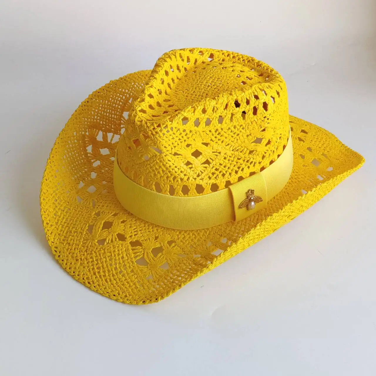 Bright yellow Cowboy hat Metal fittings fashion hollow handmade cowboy straw hat men's summer outdoor travel beach hat unisex