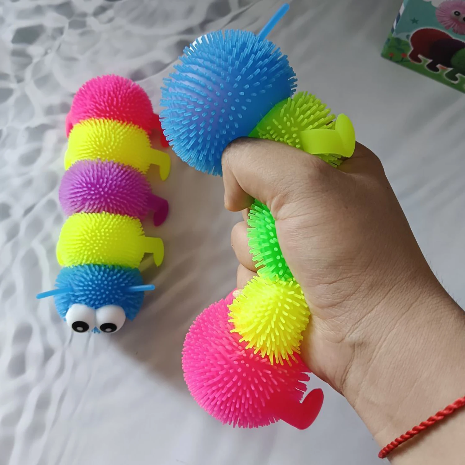 Cartoon eye-catching five section caterpillar squeezing and decompression toy, new and unique with light decompression toy