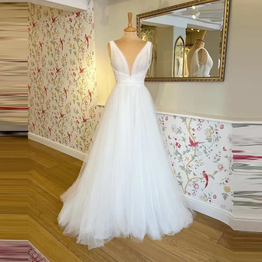 Robe de mariée trapèze élégante en Tulle, col en v profond, style Boho, sans manches, Simple, dos nu, longue, Chic, pour la plage, 2023