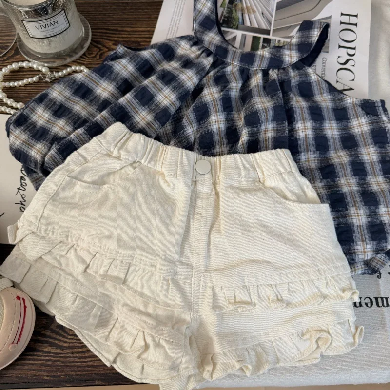 Korean children's clothing 2026 new summer plaid hanging neck sleeveless flower bud top washed lace shorts two-piece set