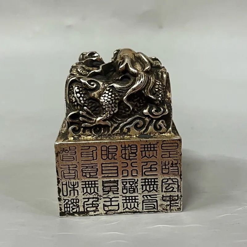 Antiqued jade seal with gold-painted dragon design