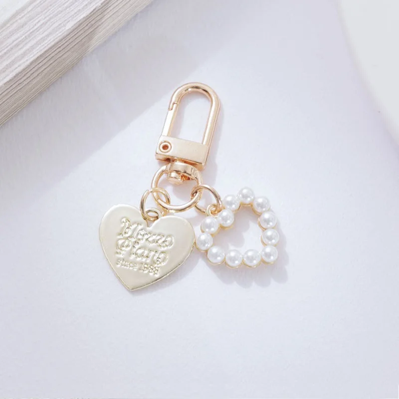 Cute Pearl Keychain Luxury Women Jewelry Shiny Pearl Bead Shell Phone Bag Backpack Charm Accessory Car Key Key Chain Pendant