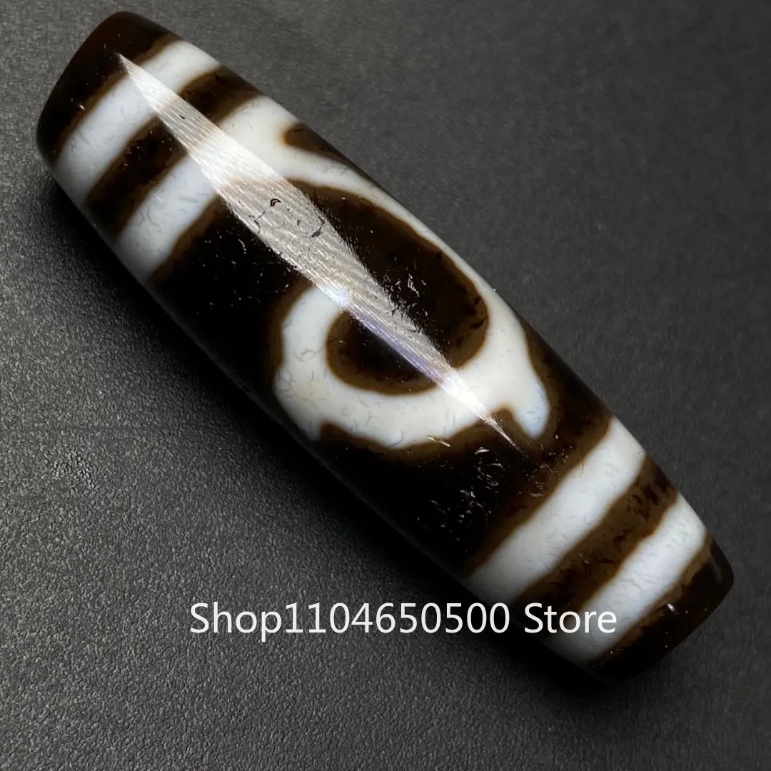 

Tooth yellow high oil Tara dzi beads agate bucket necklace pendant Duobao bracelet bead back cloud pendant accessories 12 * 42m