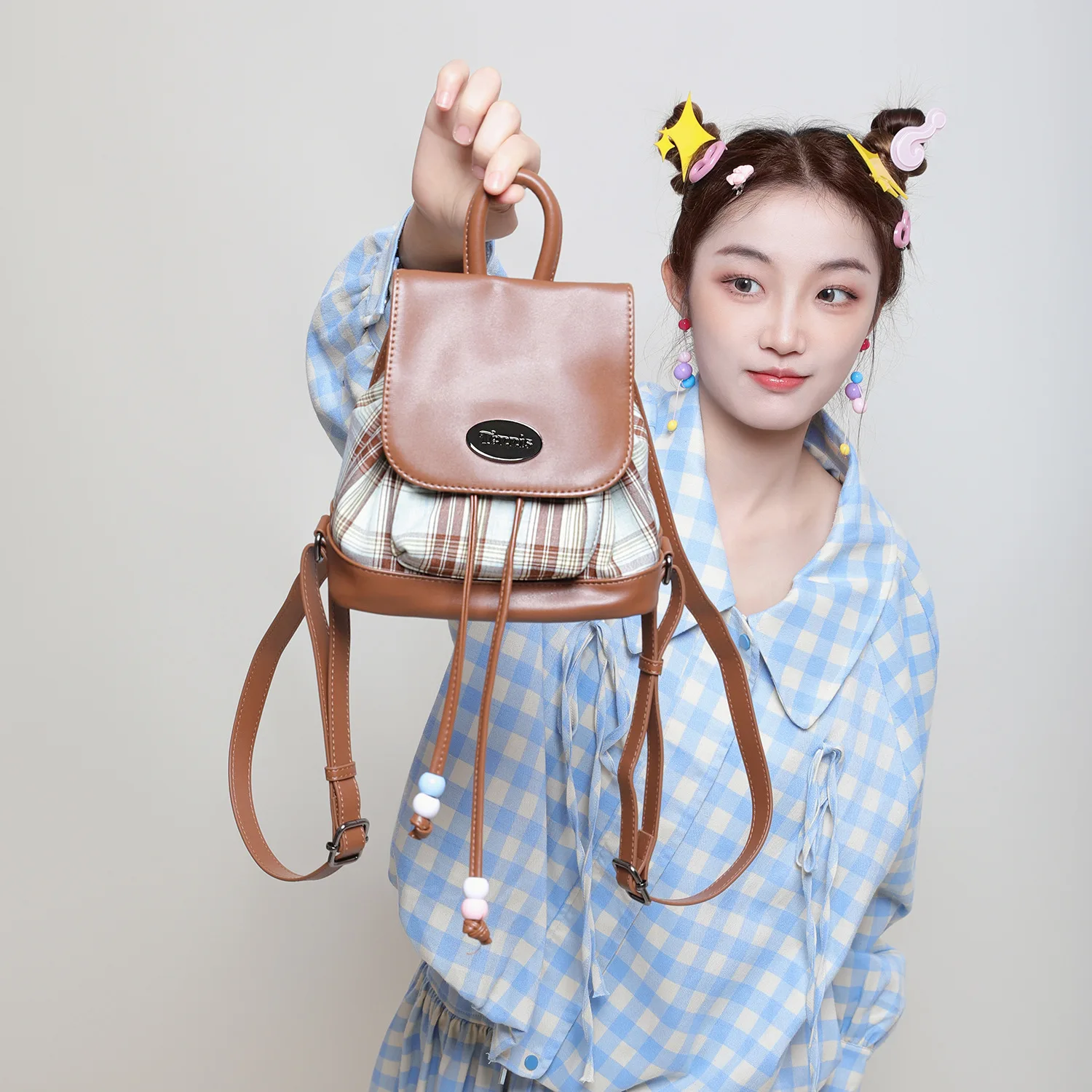 Denim and PU leather stitched women's small backpack with striped and color-matching design, cute and eye-catching travel bag