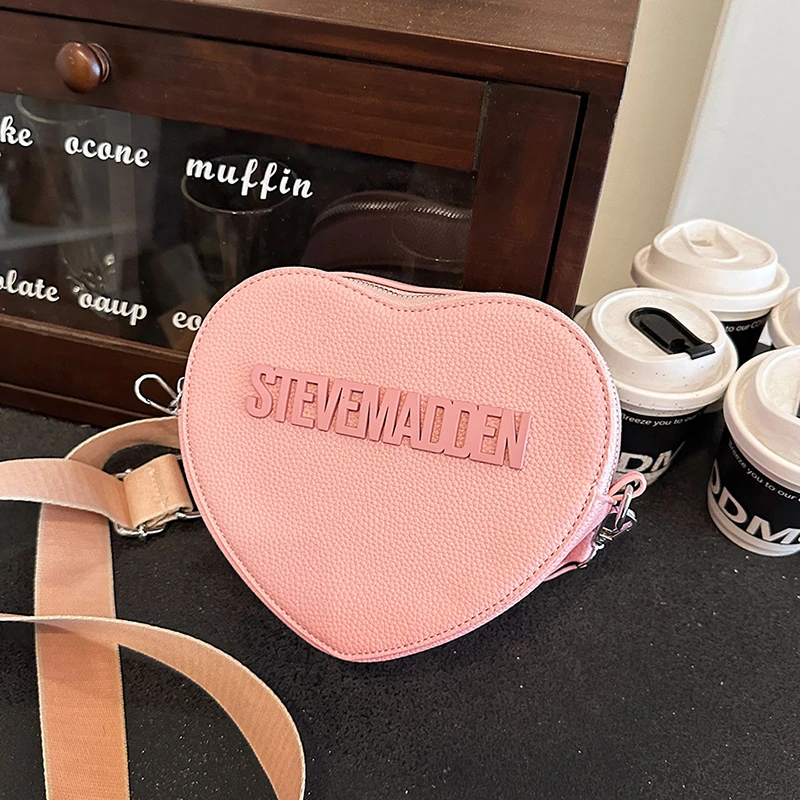 Contemporary Saddle Shoulder Bag In Buttery Soft Leather Streamlined Design For Gallery Visits And Business Luncheons