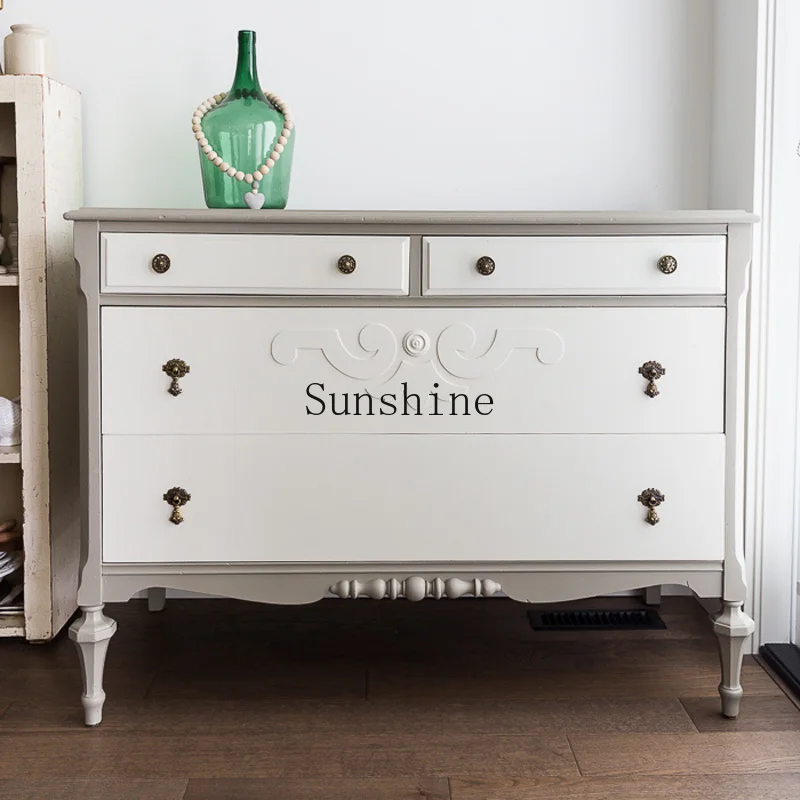 

French retro gray chest cabinet against the wall