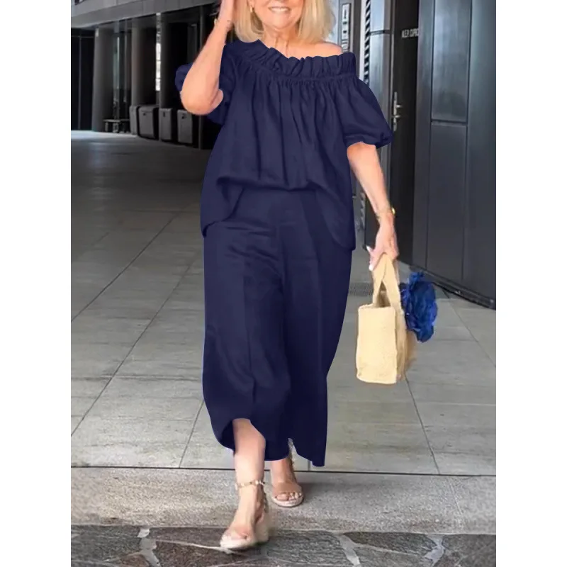 2025 カジュアルワンショルダートップ & ロングパンツスーツ女性エレガント半袖固体ルーズ 2pc セットファッション通勤衣装