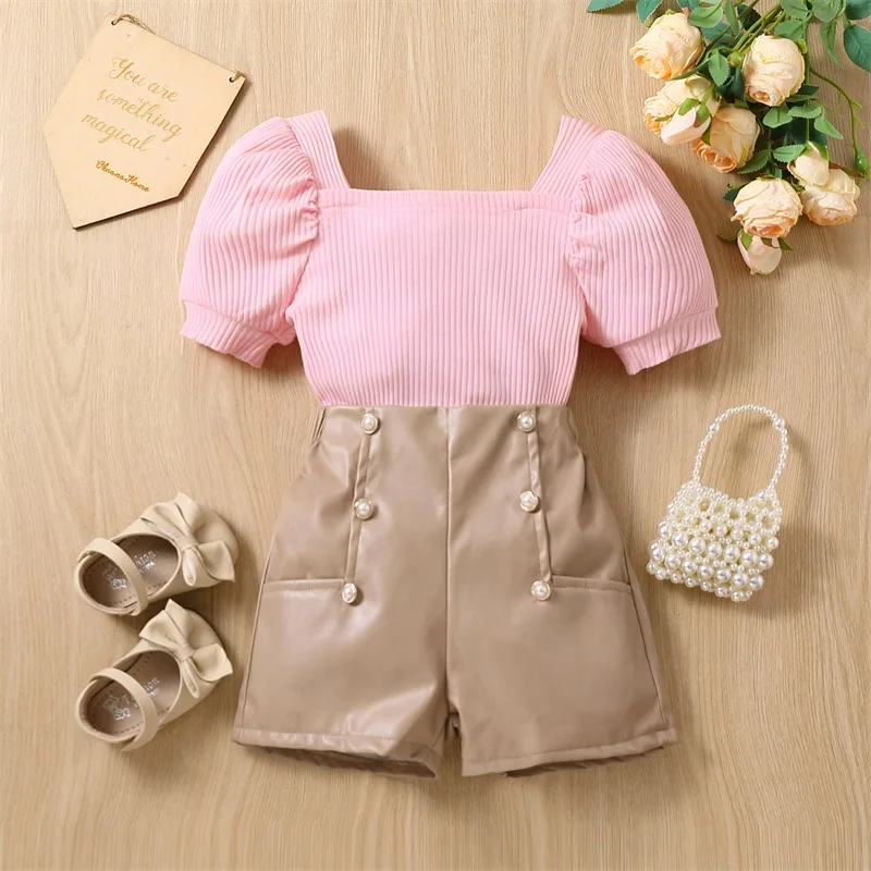 2023-02-21 Lioraitiin 0-6Years Toddler Girls 2Pcs Summer Outfit Sets Pink Short Sleeve Knit Ribbed Tops Brown Button Shorts