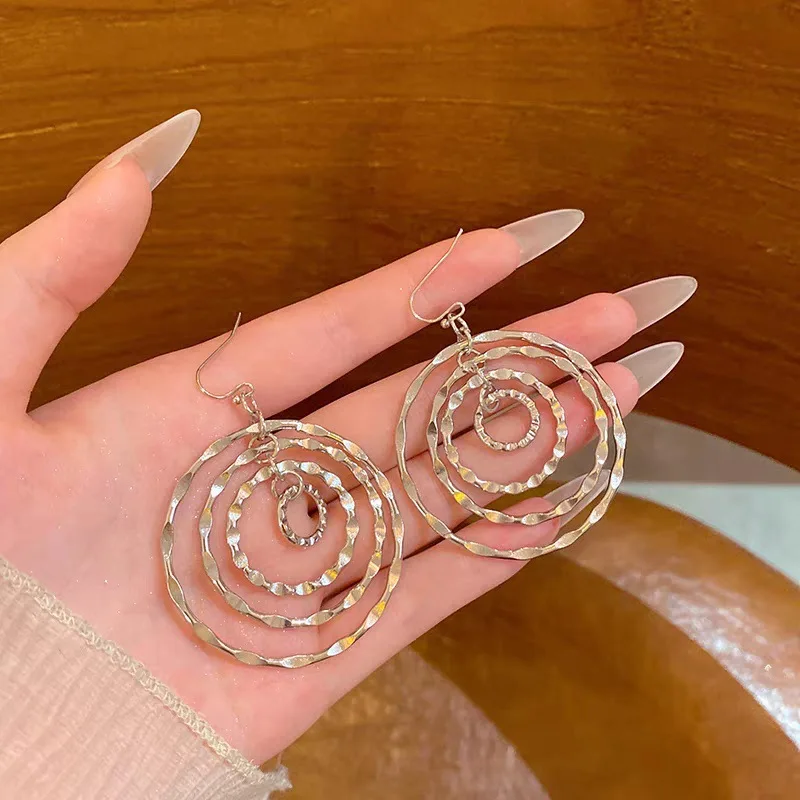 Retro Subtle design sense Individuality  Fashion Personality  Simplicity Multiple layers  Hammer marks Circle  Alloy Ear hook