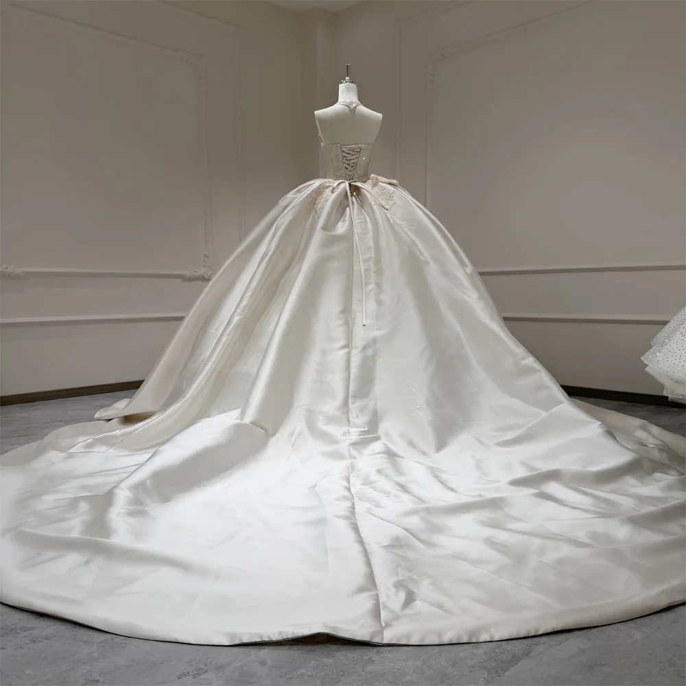 فستان زفاف قابل للتخصيص بدون حمالات مع أربطة خلفية، فستان عروس بدون أكمام مع تطريز 2026