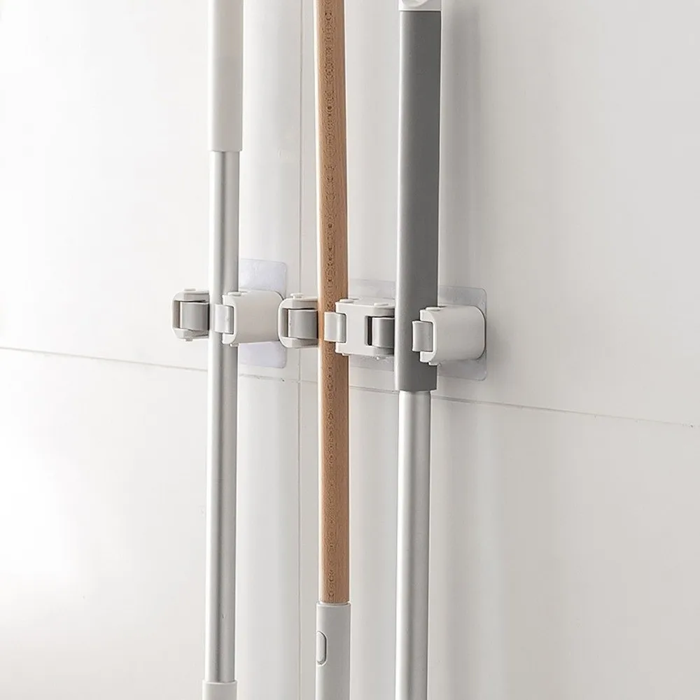 

Многофункциональный зажим для швабры без следов, подвесной пластиковый держатель для швабры, многоразовый водонепроницаемый настенный зажим для ванной комнаты