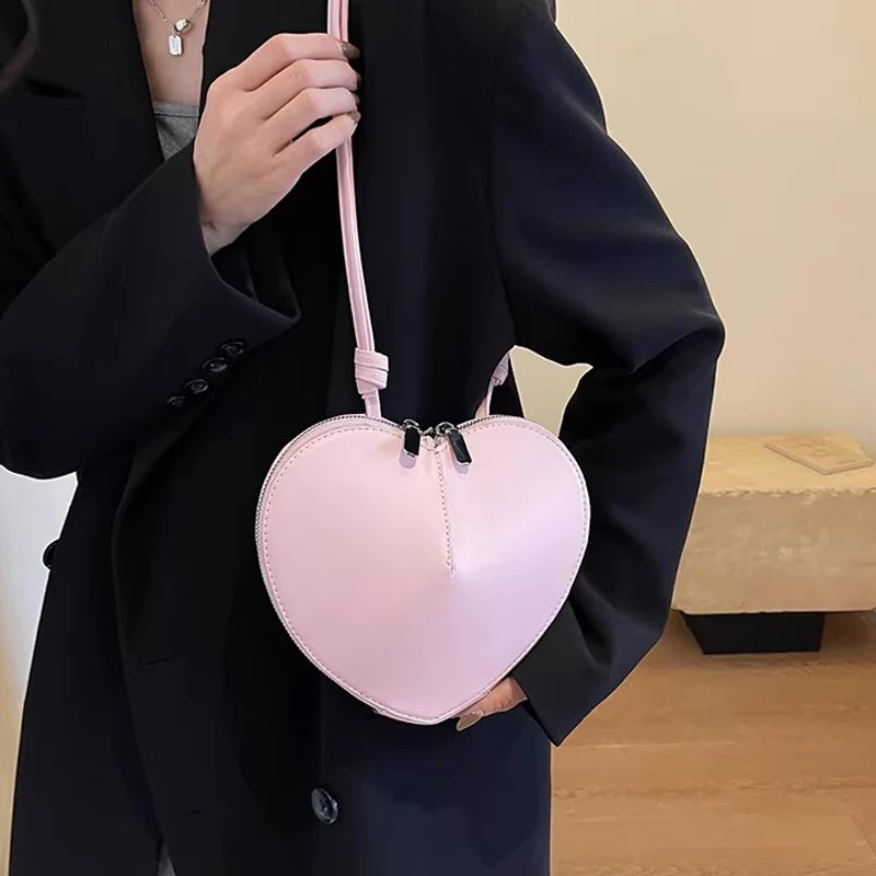 Borse firmate a forma di cuore pesca donna 2024 nuova moda semplice Versatile Mini borsa a tracolla borsa sotto le ascelle in pelle PU