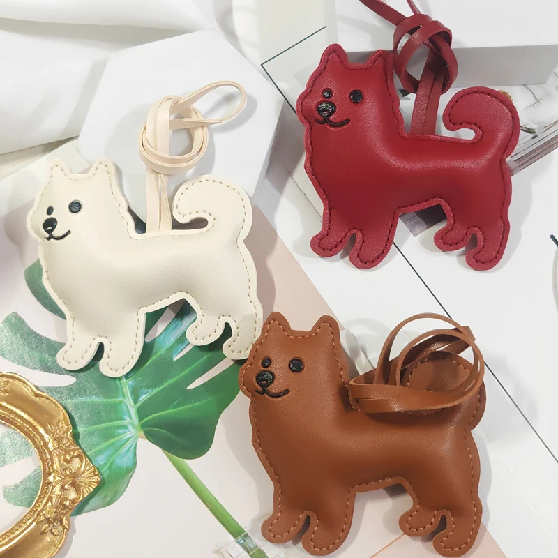 Lindo dibujo animado pu cuero pueblo chino perro bolsa encanto moda coche llavero bolso mochila colgante amantes de los perros regalo de Navidad