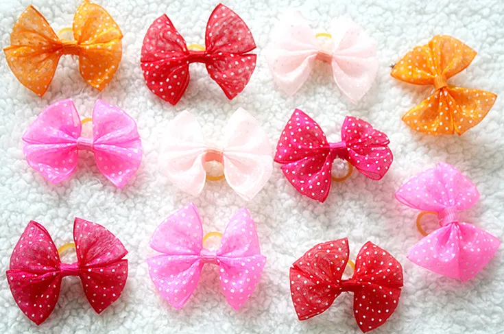 50pcs dog topknot bows pet hair Rubber bands Patterns Large Bowknot Style dog hair accessories pet grooming products