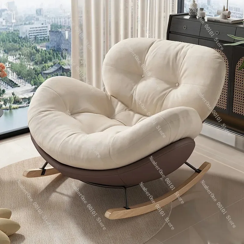 Modern minimalist rocking lounge chair for balcony or living room relaxation,soft lazy sofa cushion design allowing both sitting