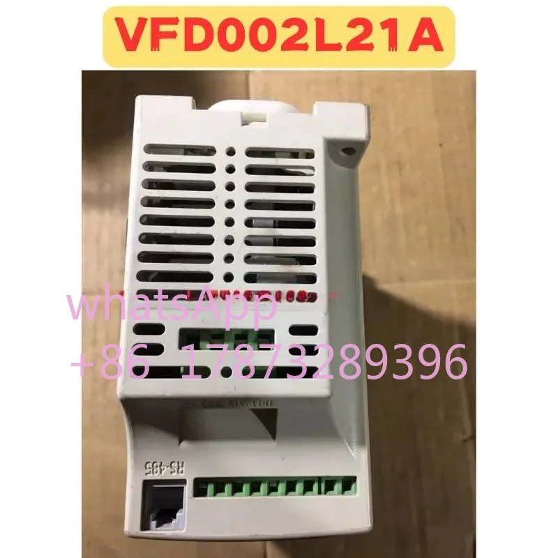 Gebrauchter Frequenzumrichter VFD002L21A Normale Funktion getestet OK