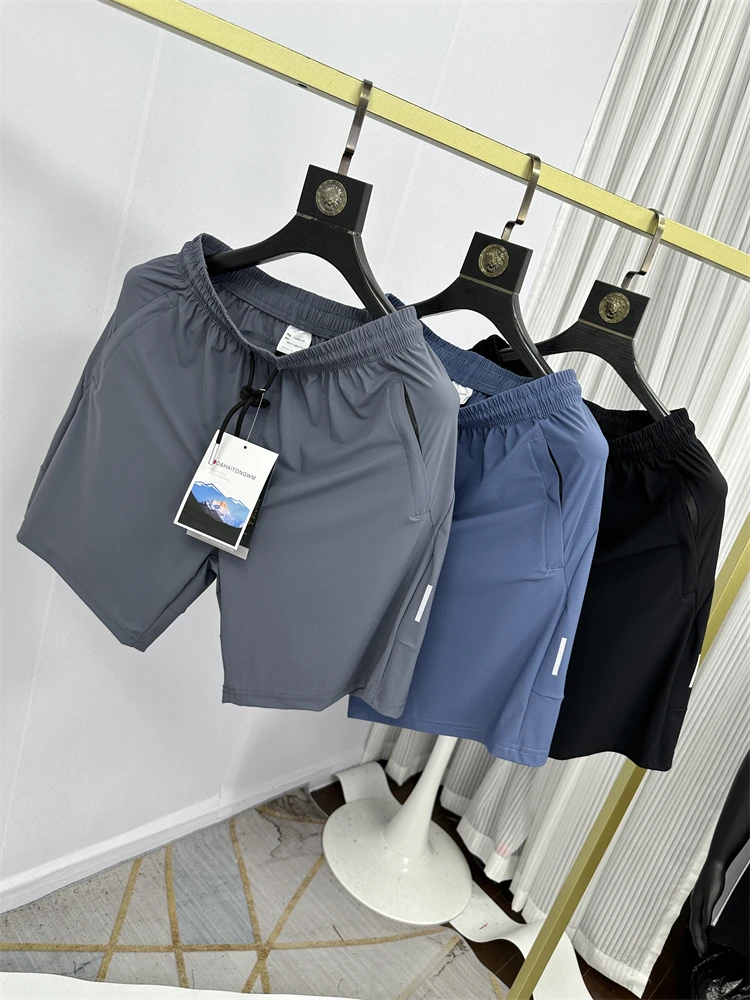 

Шелковистые, гладкие, как молоко, летние новые мужские шорты с высокой эластичностью, быстросохнущие, дышащие, светоотражающие, для активного отдыха, повседневные.