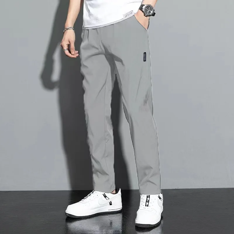 2024 men\'s casual pants ice silk pants men\'s Korean version plus size fashion trend straight leg pants casual small leg pants