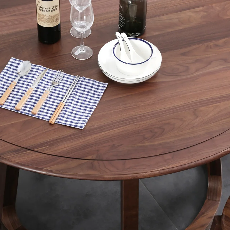 Mesa de jantar redonda de madeira maciça de nogueira preta norte-americana nórdica moderna e simples mesa de jantar e cadeiras domésticas pequenas separadas